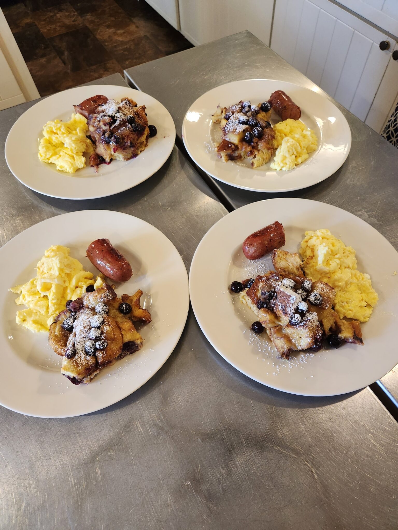 Blueberry french toast crumble, scrambled eggs, and sausage