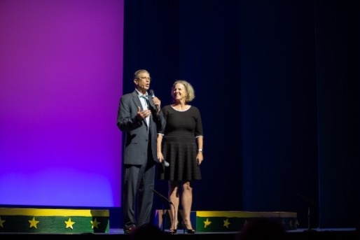 Sally and Mike Curci On Stage Introducing the Shining Stars Newtork Performers