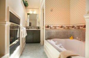 The Avondoglio Room Two-Person Soaking Tub and Double-Sided Fireplace